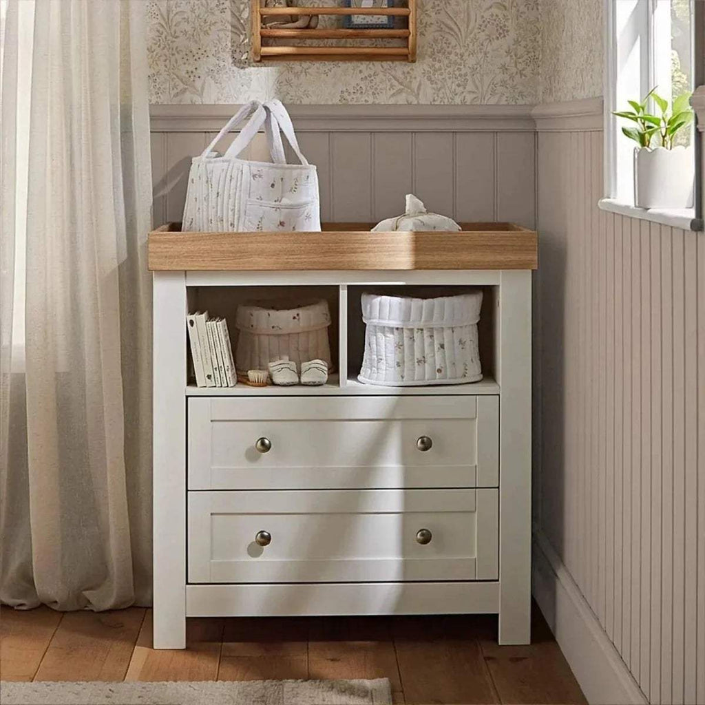 White baby dresser changer with oak top, open shelf and two front drawers