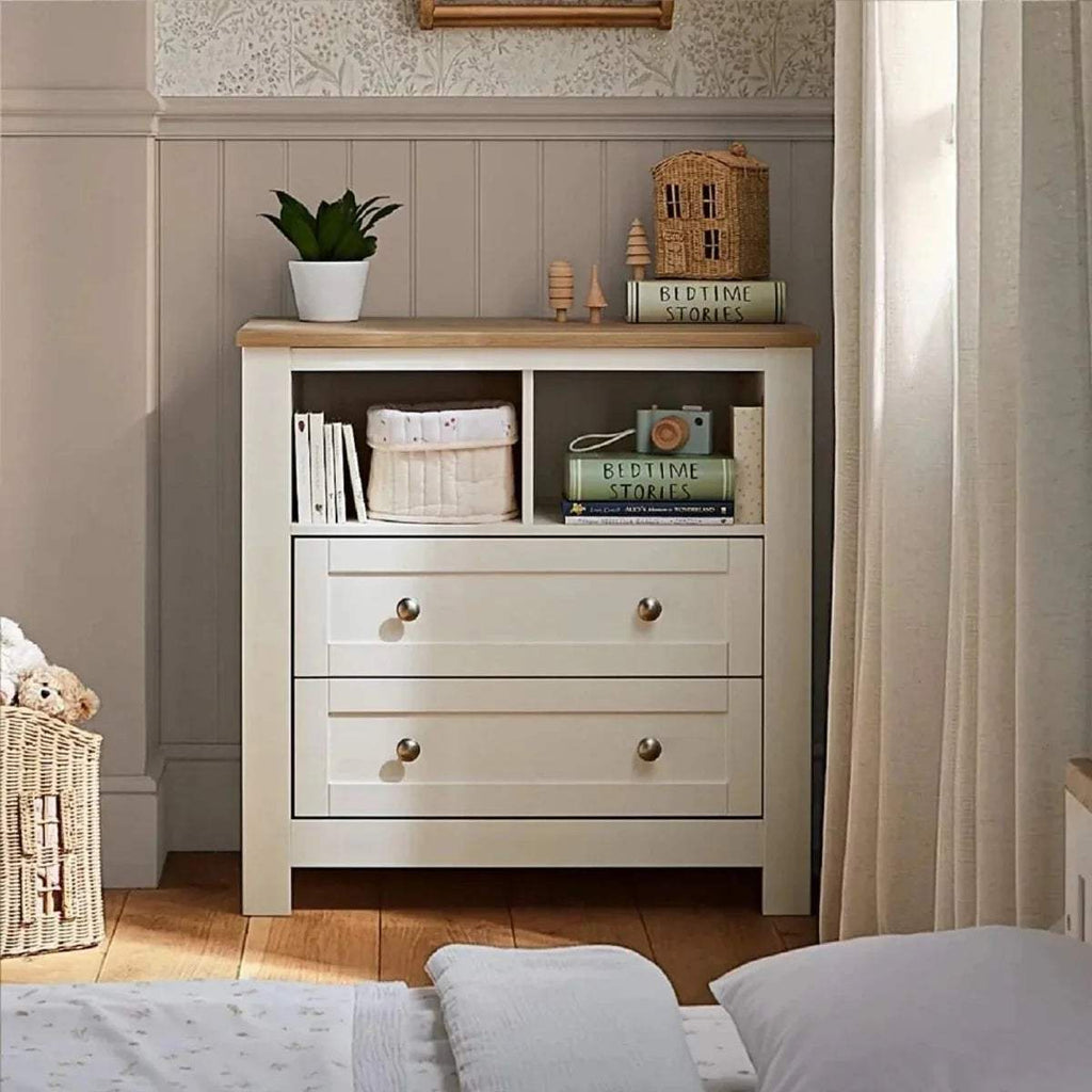 White dresser changer with oak top, open storage shelves and three drawers