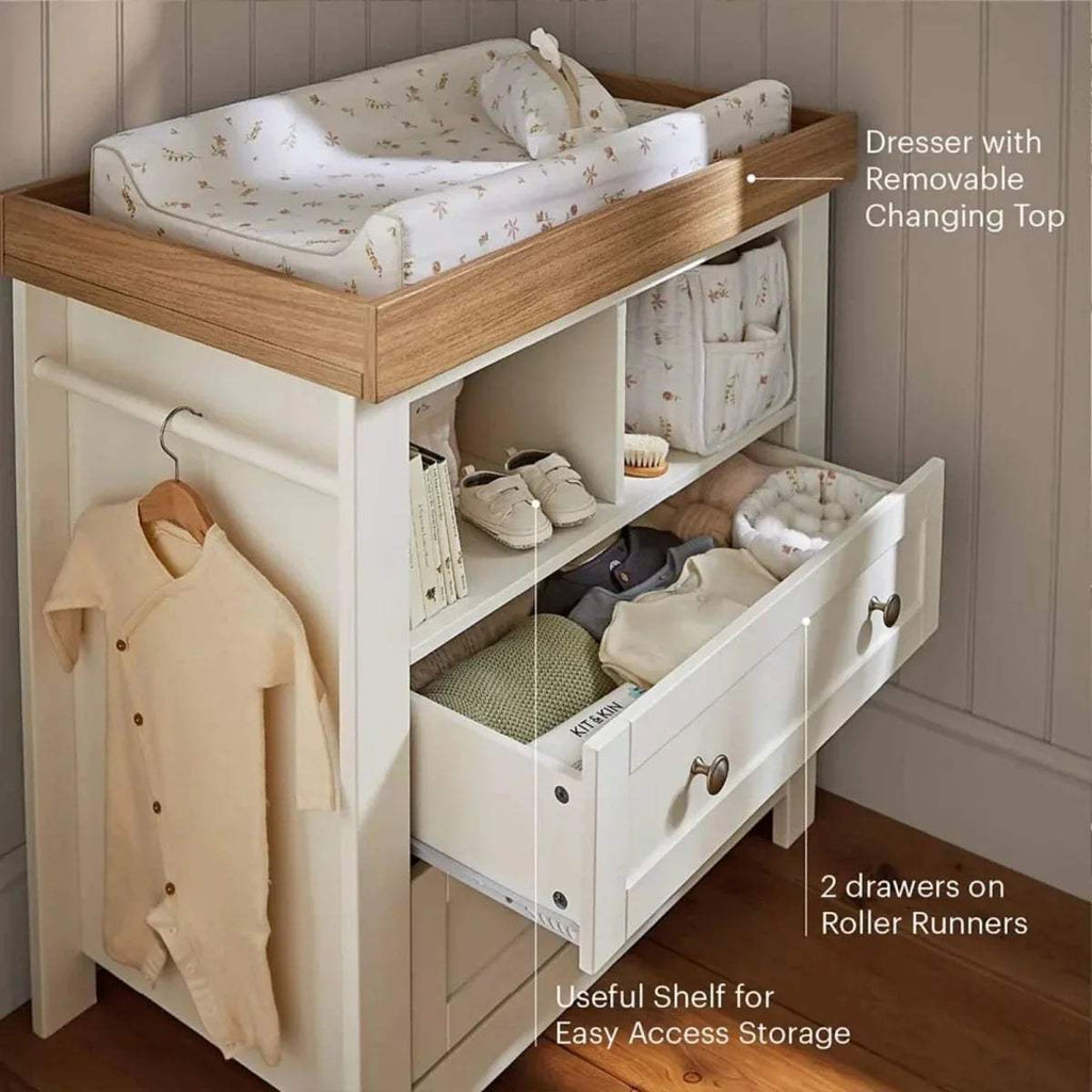 White dresser changer with removable changing top, open shelves and two drawers