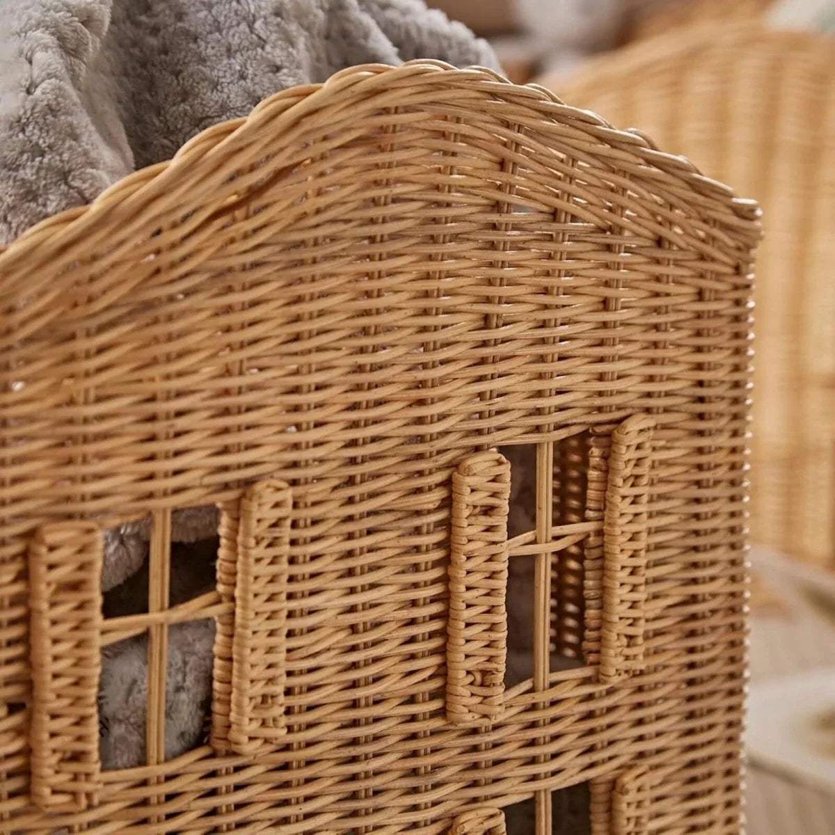 Close-up of tan woven basket front with small window cutout details