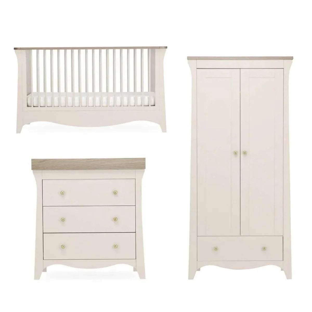 White nursery furniture set: crib, 3-drawer dresser, and wardrobe cabinet