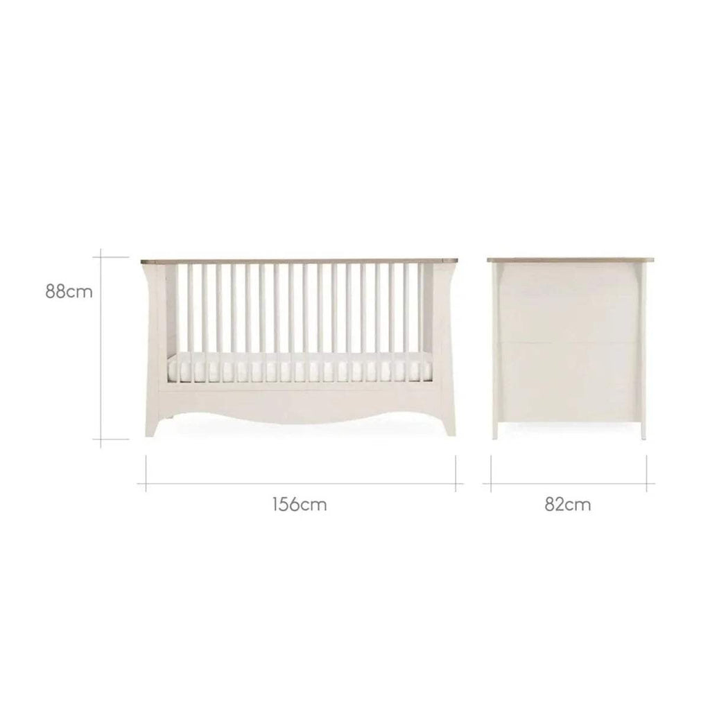 Off-white nursery crib and small cabinet with slat headboard, size diagram