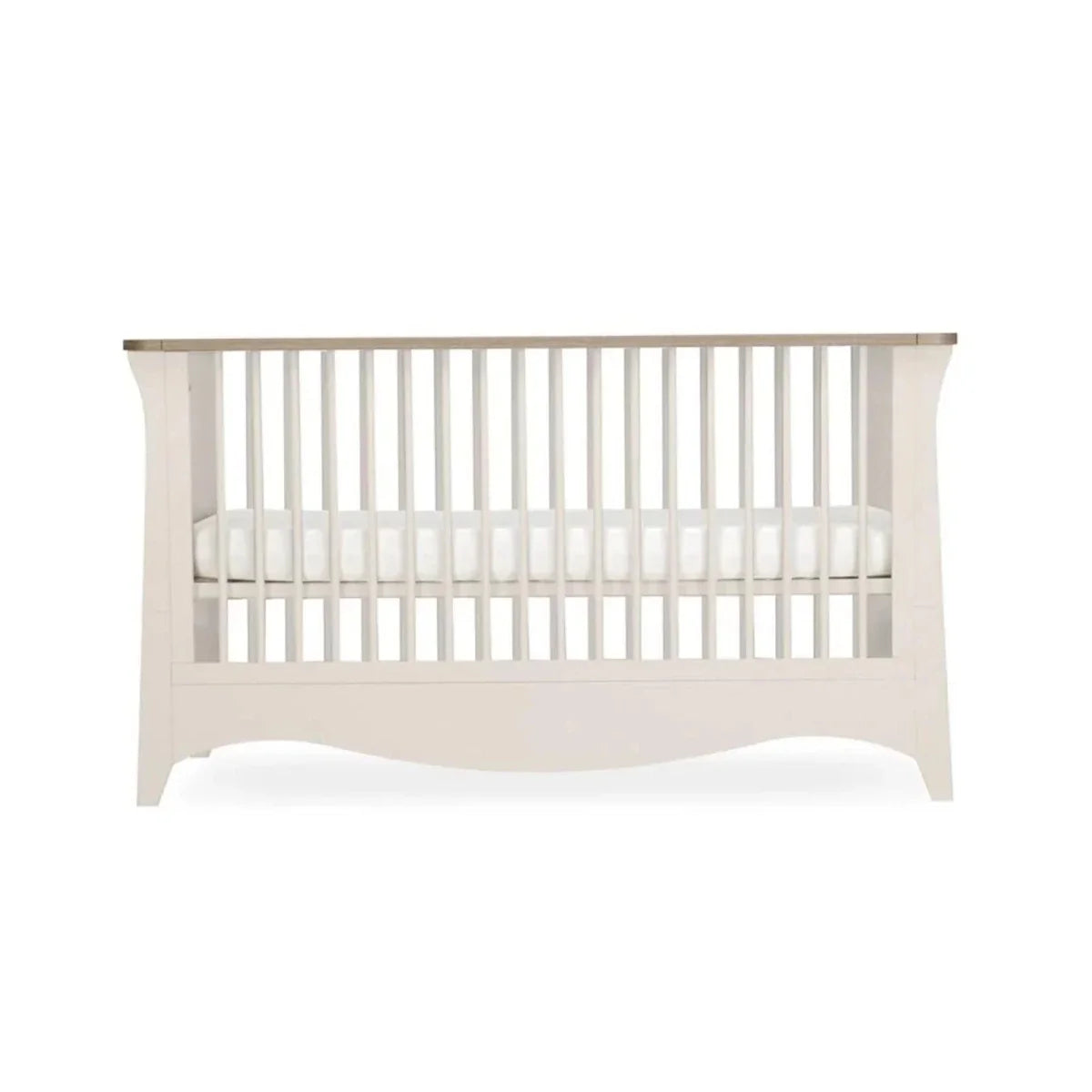 White nursery crib with vertical slat guard rails, centered front view
