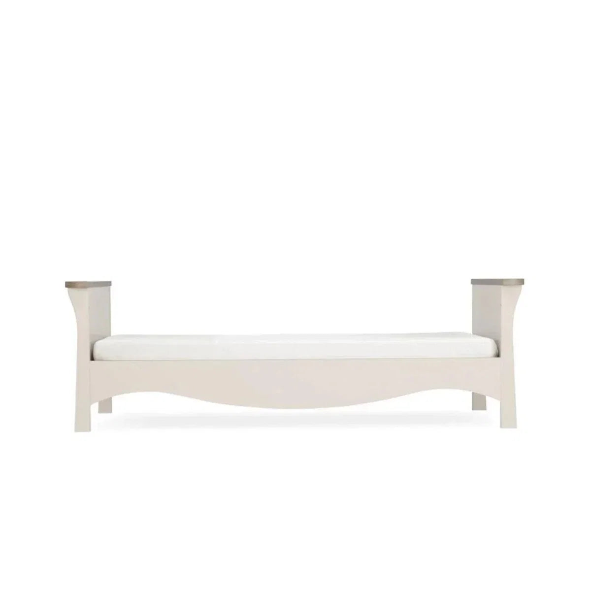 Light-colored toddler daybed frame with curved ends and side posts, front view