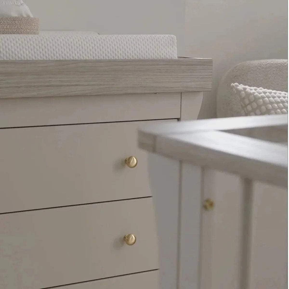 White dresser changer drawer front with gold knob handle