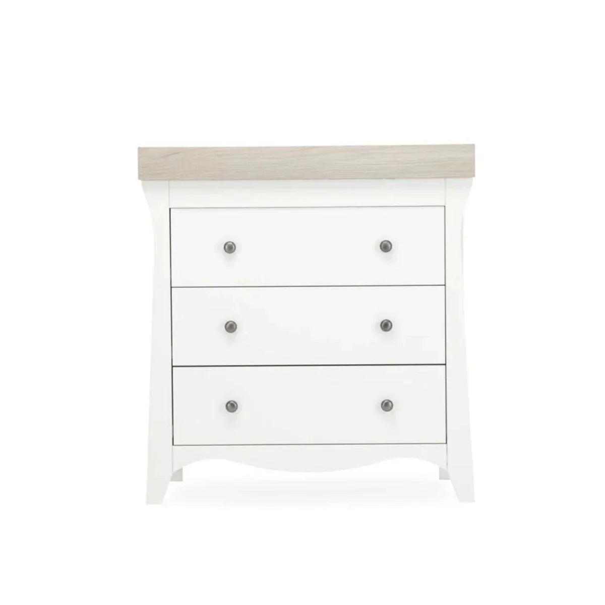 White nursery dresser with three drawers and ash-toned top trim
