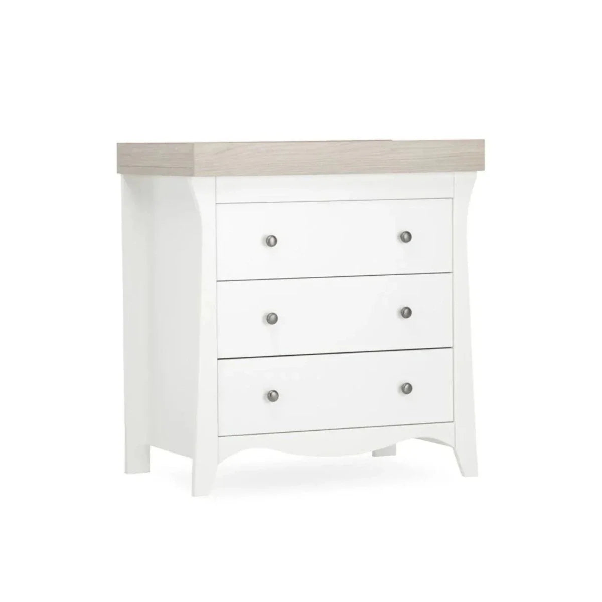 White nursery dresser with three drawers and ash-toned top panel