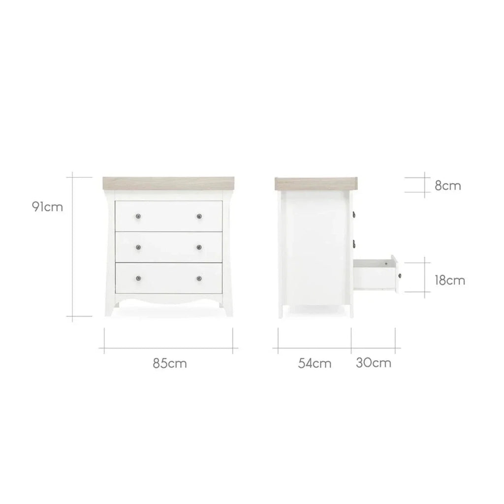 White nursery dresser cabinet with three drawers and matching open side cabinet
