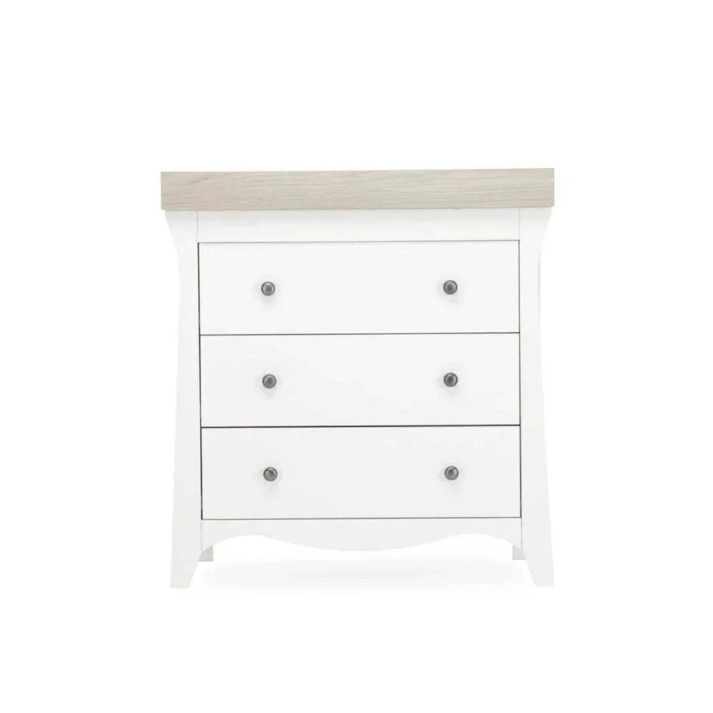 White 3-drawer dresser changer, front view with metal knob pulls and top rail