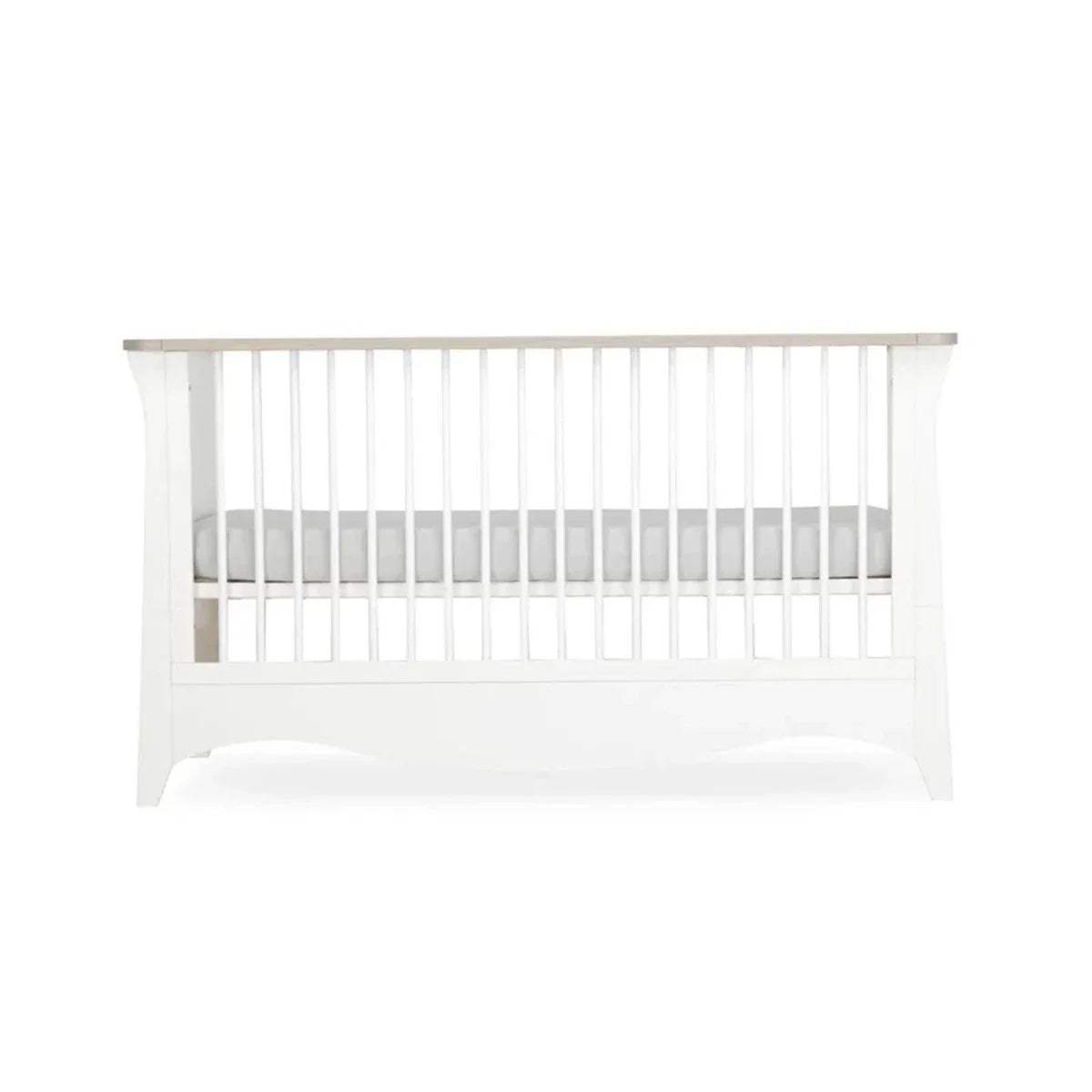 White cot bed with vertical slatted sides and low front panel, rectangular frame