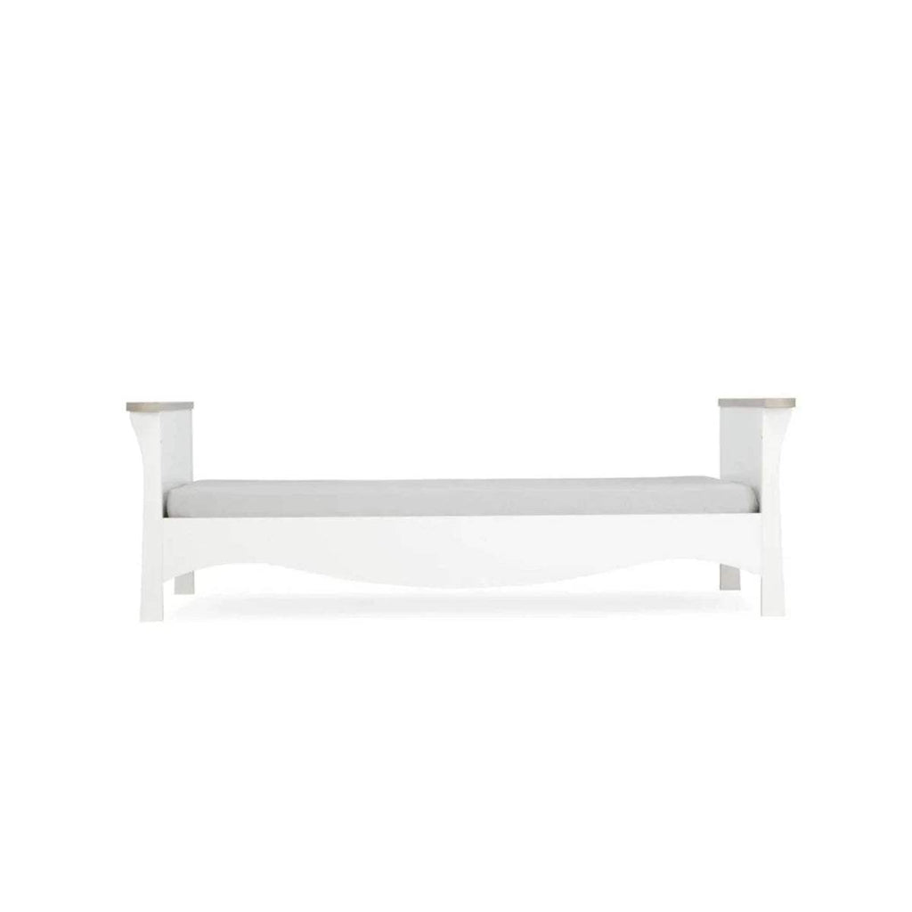 White cot bed with panel ends and smooth rails, open front
