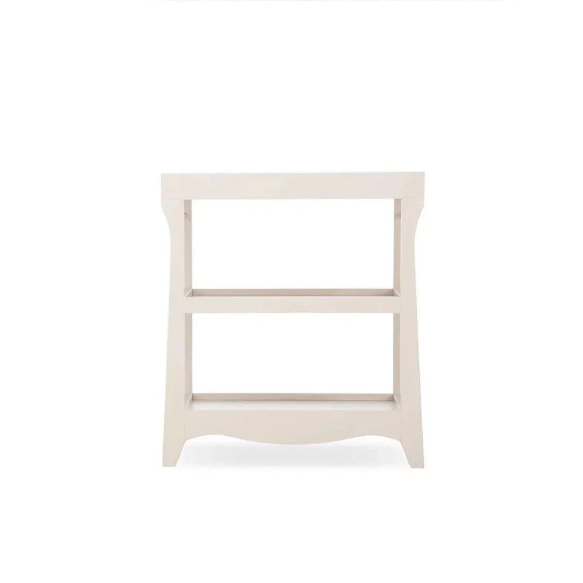 White mini baby changing table frame with open center shelves