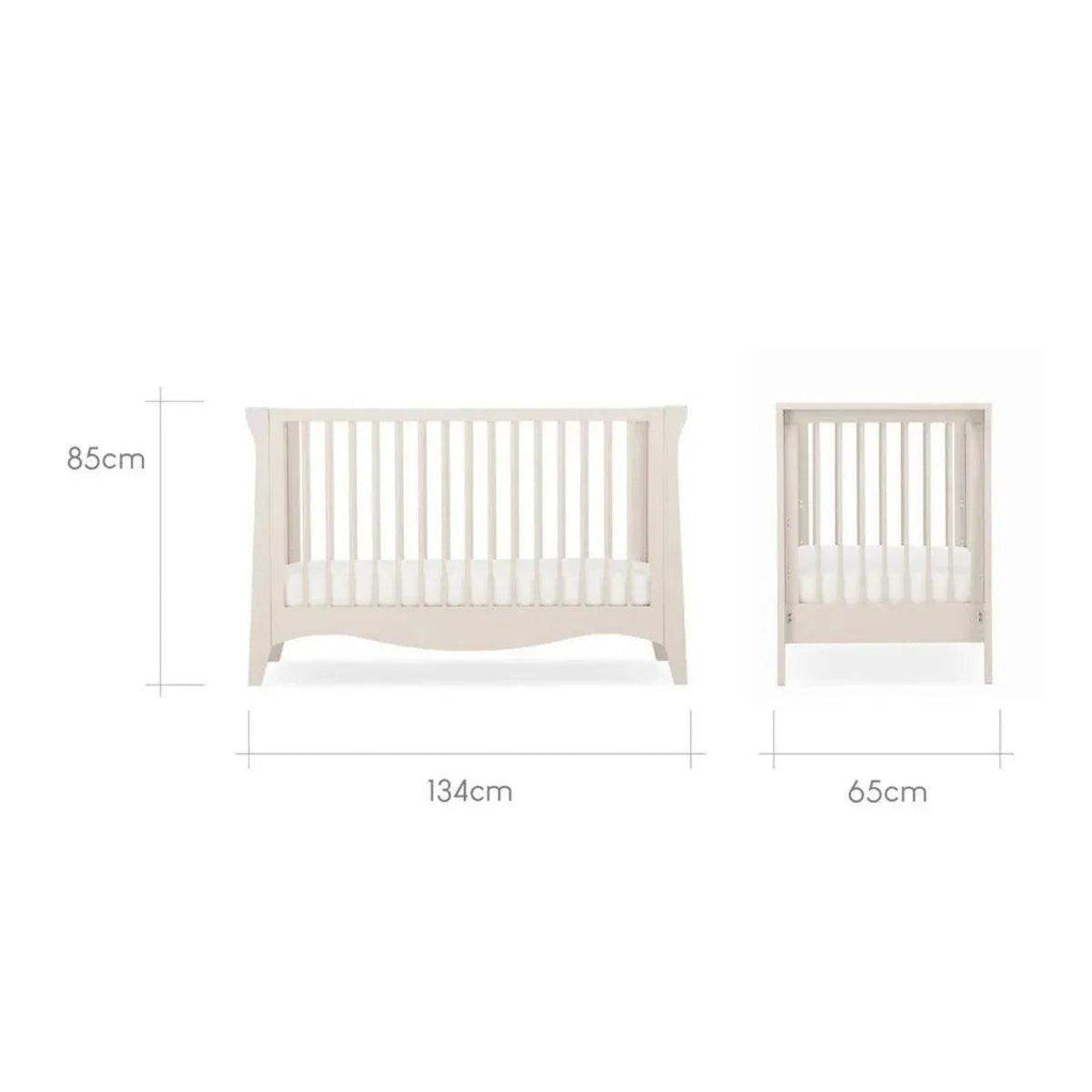 Mini cot bed size diagram showing 134cm width and 85cm height with side view