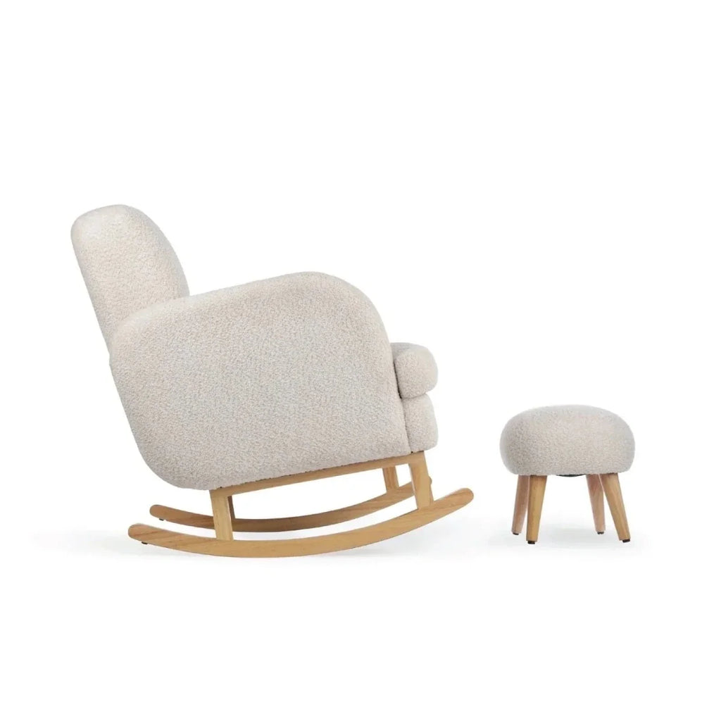 Light beige boucle nursing chair on curved rocker legs with matching round ottoman