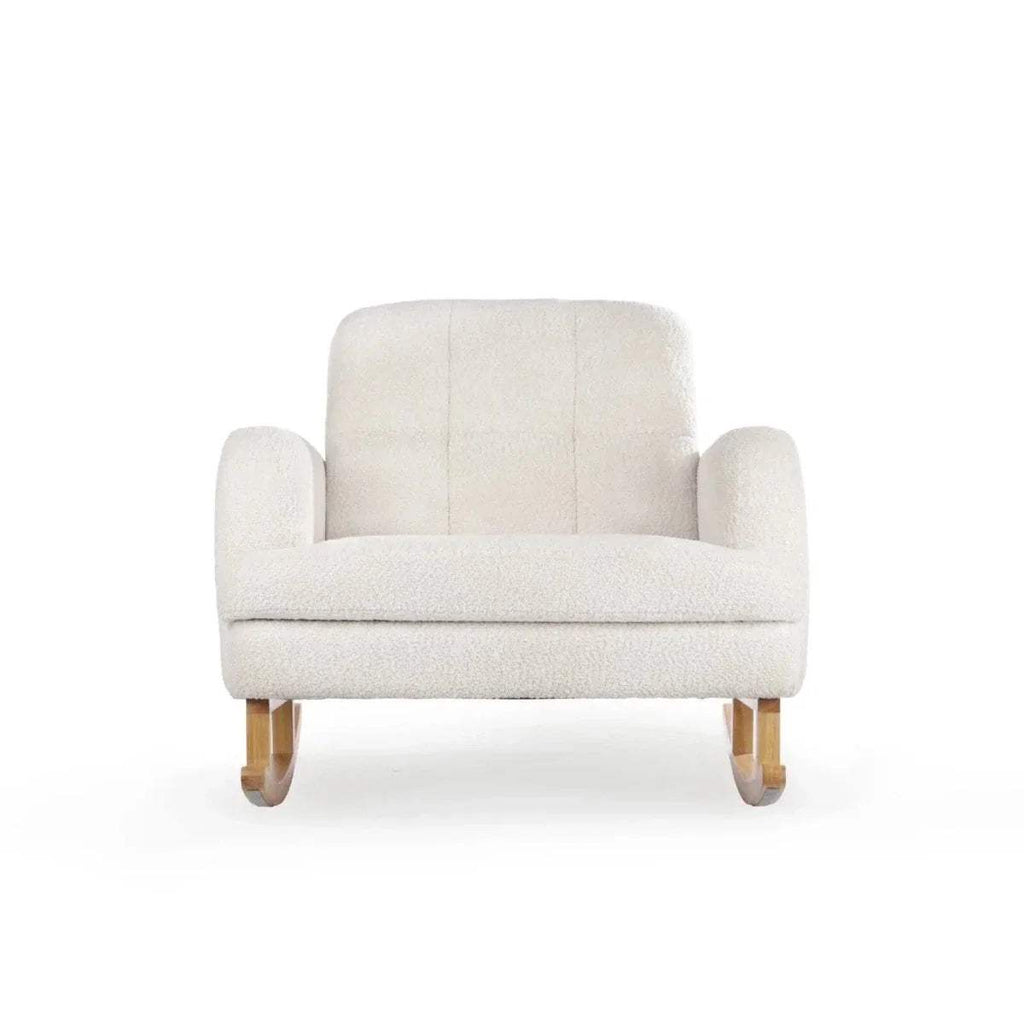 Off-white boucle nursing chair with padded arms and short turned wood legs