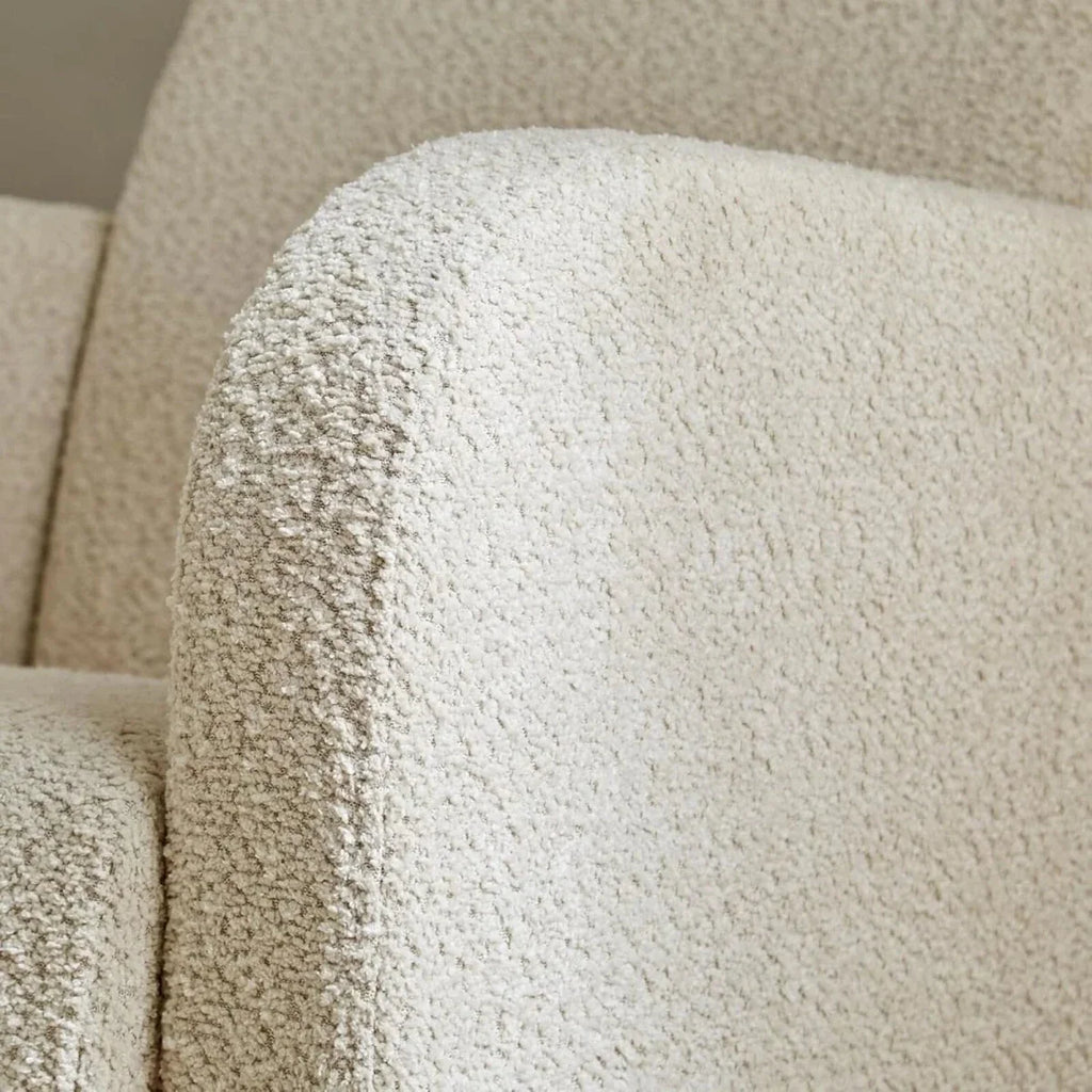 CuddleCo Etta nursing chair armrest in mushroom boucle