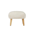 Sand upholstered footstool with rounded cushioned top and four light wood legs