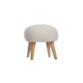 Boucle foot stool in mushroom beige with cushioned round seat and light wood legs.