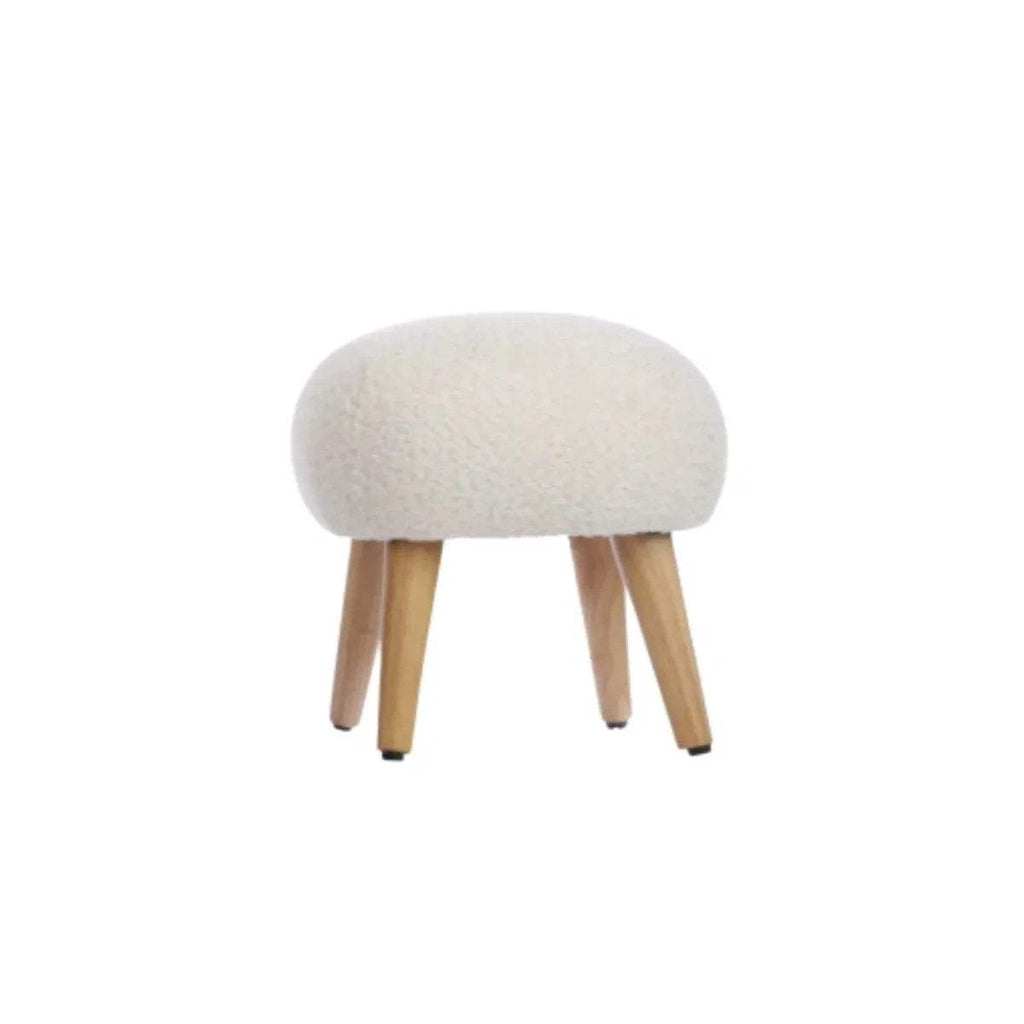 Off-white boucle foot stool with rounded padded top and tapered wooden legs