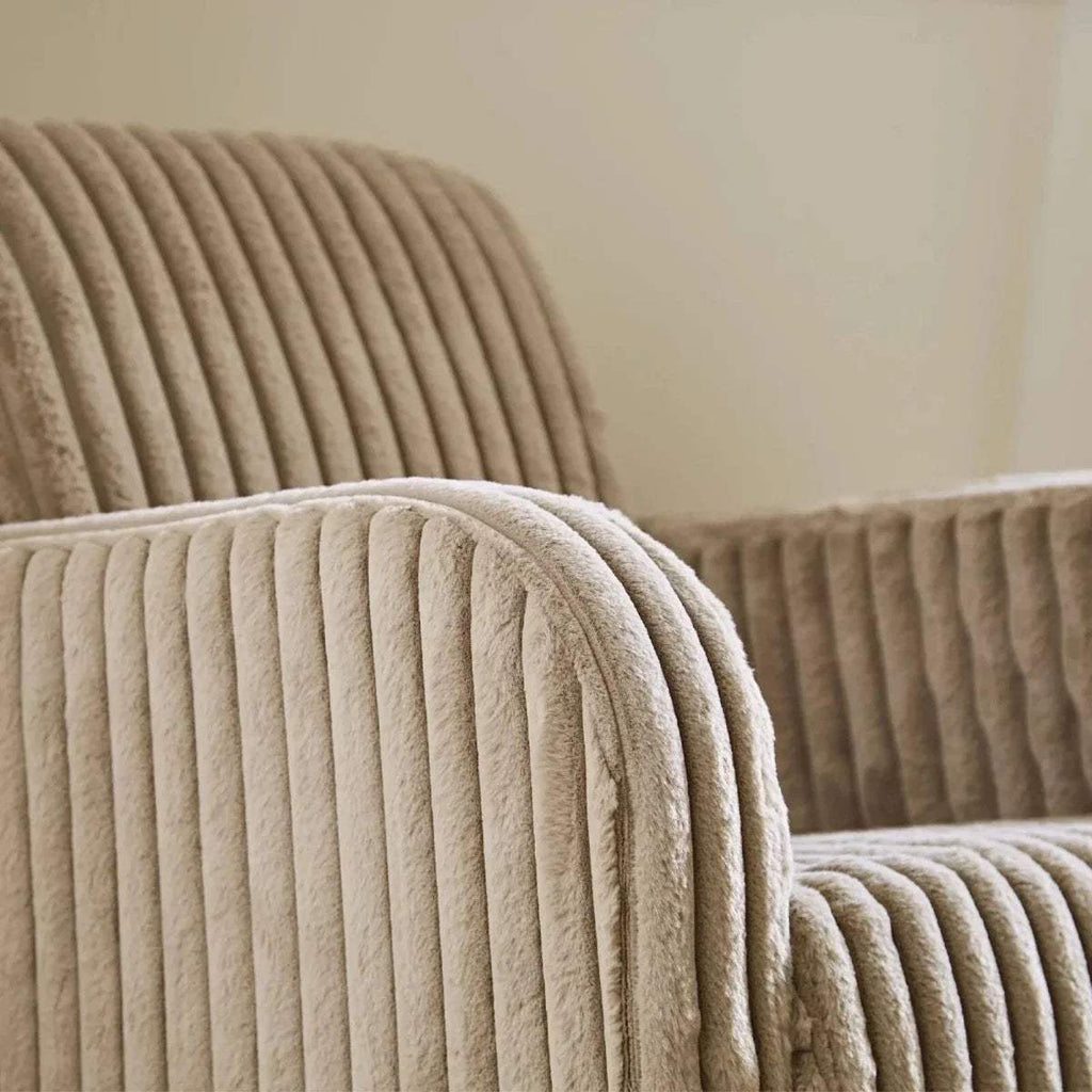 Padded nursing chair armrest and arm with ribbed mink faux-fur texture