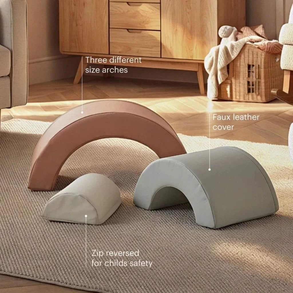 Three-size arched play cushions in mauve and gray with white inner padding