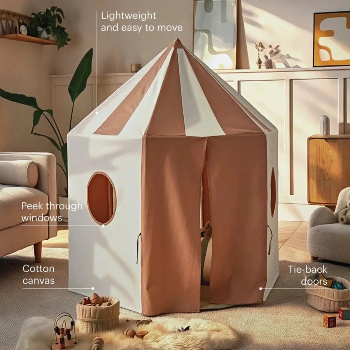Play tent with cream canvas walls, brown tie-back doors, and oval peek-through windows