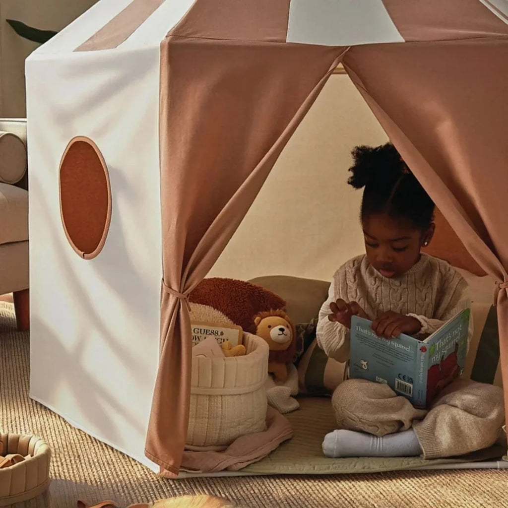 Play tent interior view with cream-and-brown fabric walls and arched front opening