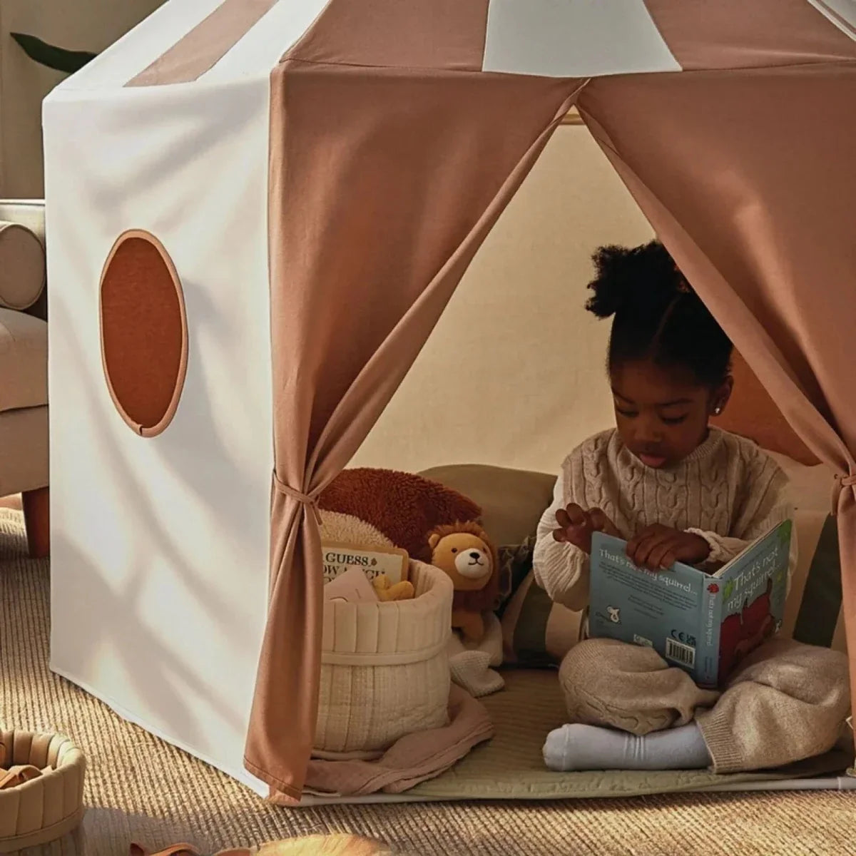 Play tent interior view with cream-and-brown fabric walls and arched front opening