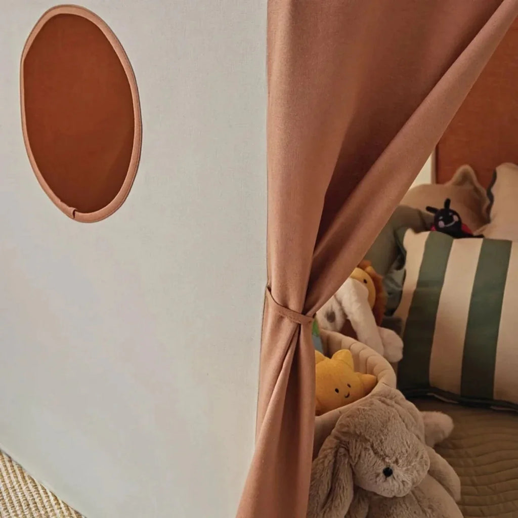 Play tent side panel with oval window and tied brown flap, cream and tan fabric