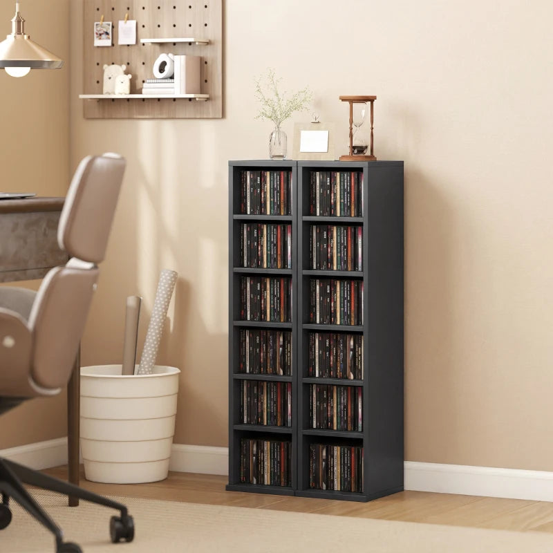 Black media shelf tower with two open columns of CD storage compartments