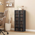 Black media shelf tower with two open columns of CD storage compartments