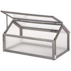 Grey wooden cold frame greenhouse with openable clear polycarbonate lid
