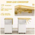 White rolling kitchen island with open drop-leaf countertop and storage cabinets