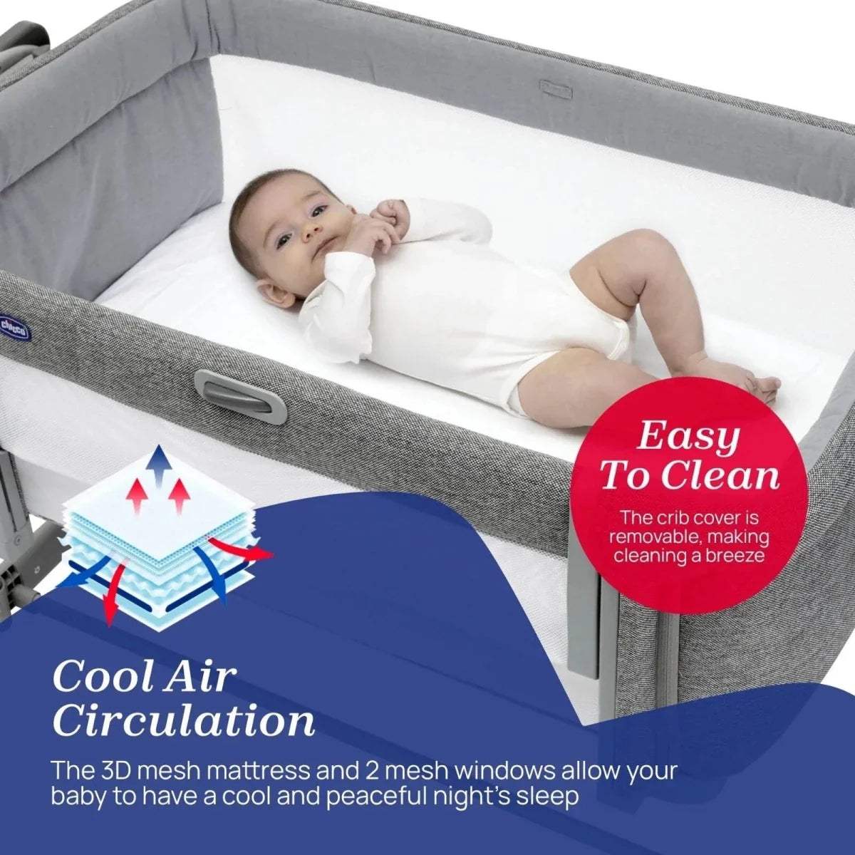Dark gray bedside crib with white mattress and removable cover