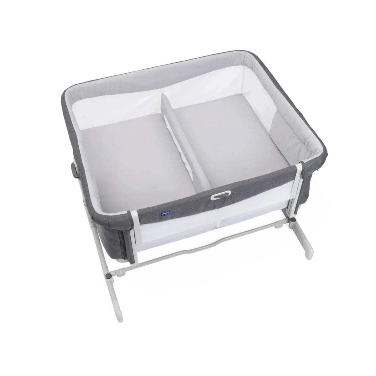 Magnet grey twin bedside crib from front-left, showing white inner mattress