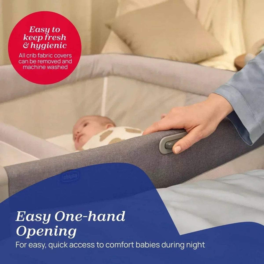 Twin bedside crib rail with latch and white mattress edge