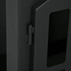 Black bioethanol stove door hinge and latch detail on front panel