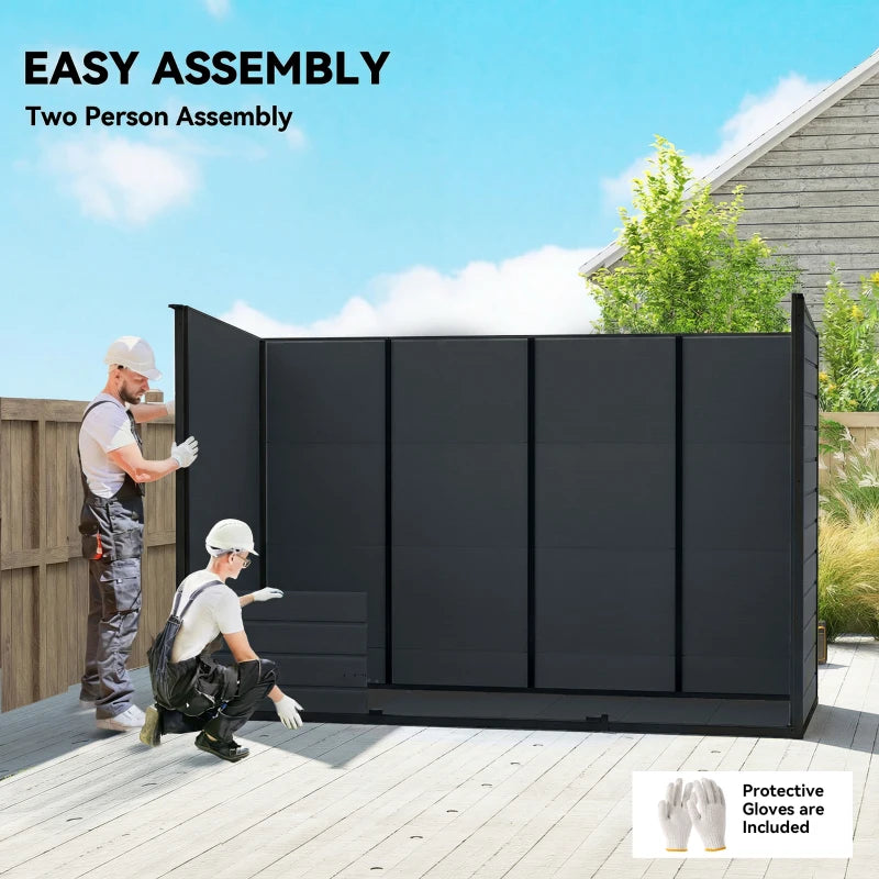 Dark grey resin shed with panel assembly and latch doors on an outdoor deck