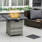 Grey rattan gas fire pit table with open burner mesh lid and visible flames