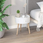 White round side table with drawer and light wood legs