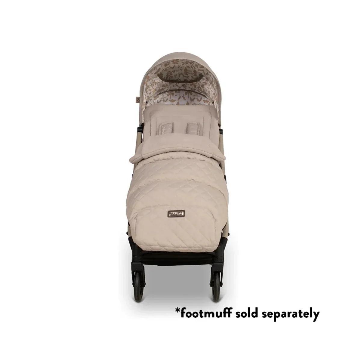 Beige stroller seat with hood and padded footmuff, front view on wheels