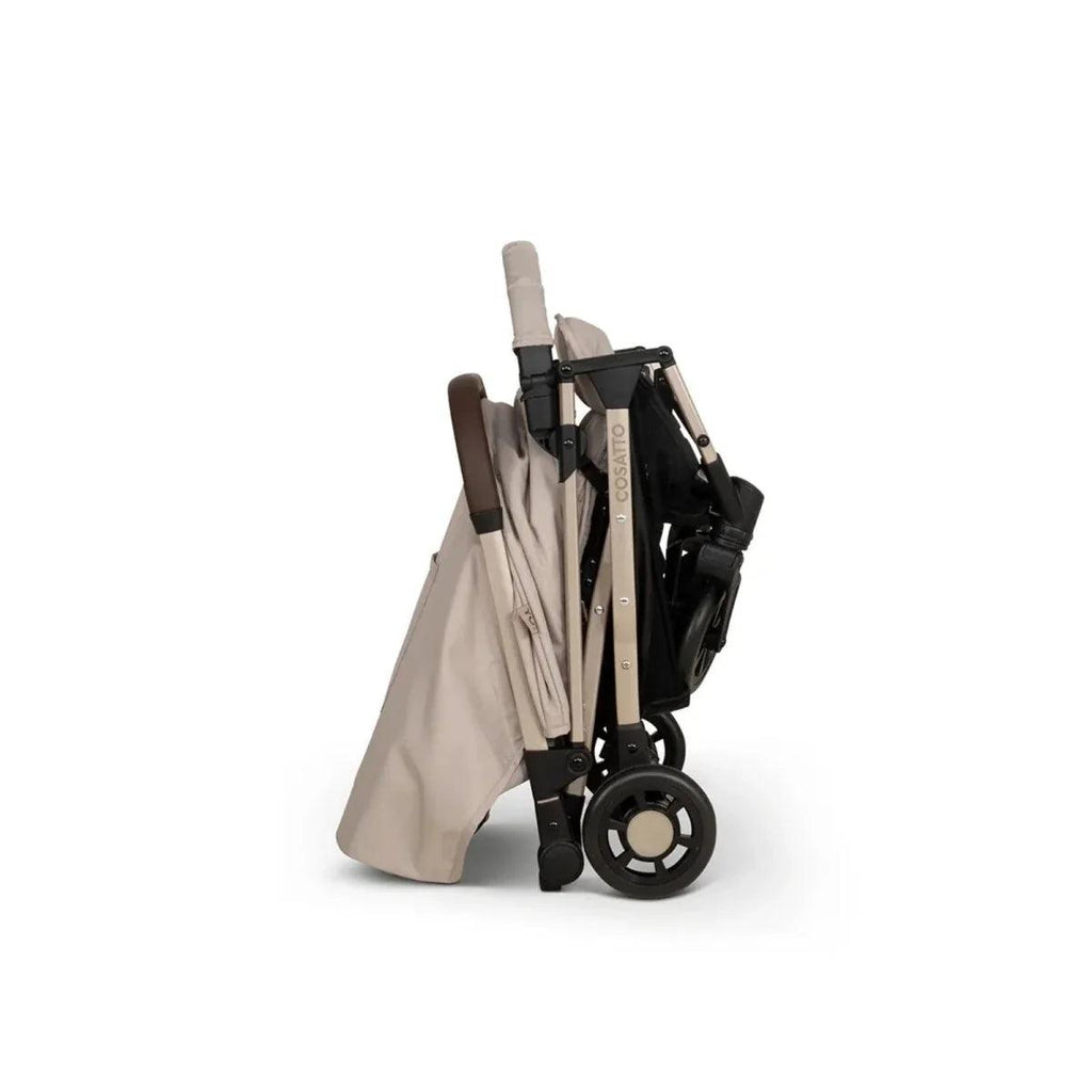 Beige stroller rear three-quarter view with folded frame and canopy