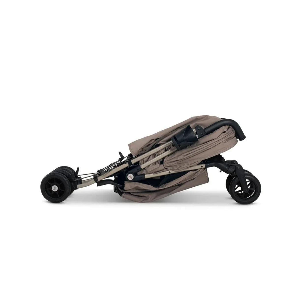 Lollop beige stroller side view with folded frame and compact wheels