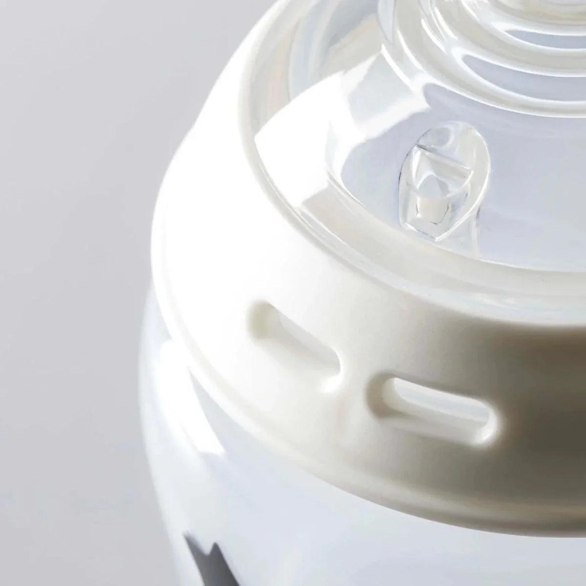 Close-up of anti-colic valve detail inside baby bottle spout