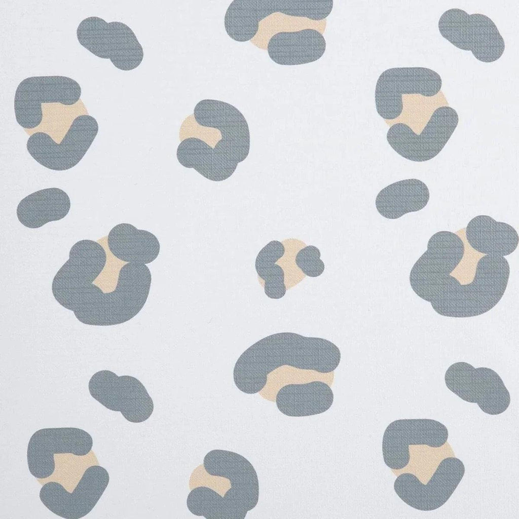 Muted leopard print fabric pattern with blue-gray and tan spots on white