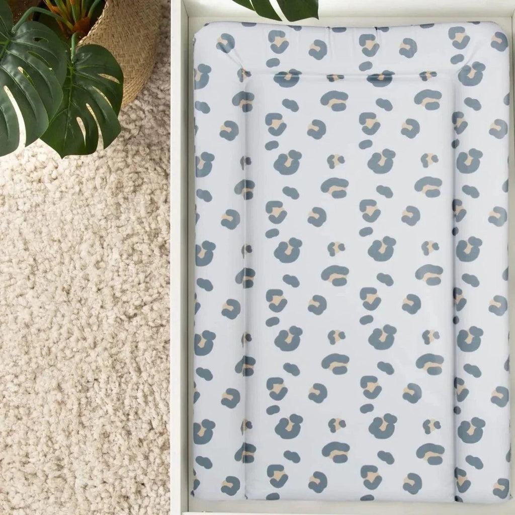 Muted leopard changing mat with all-over print, folded into a slim rectangle