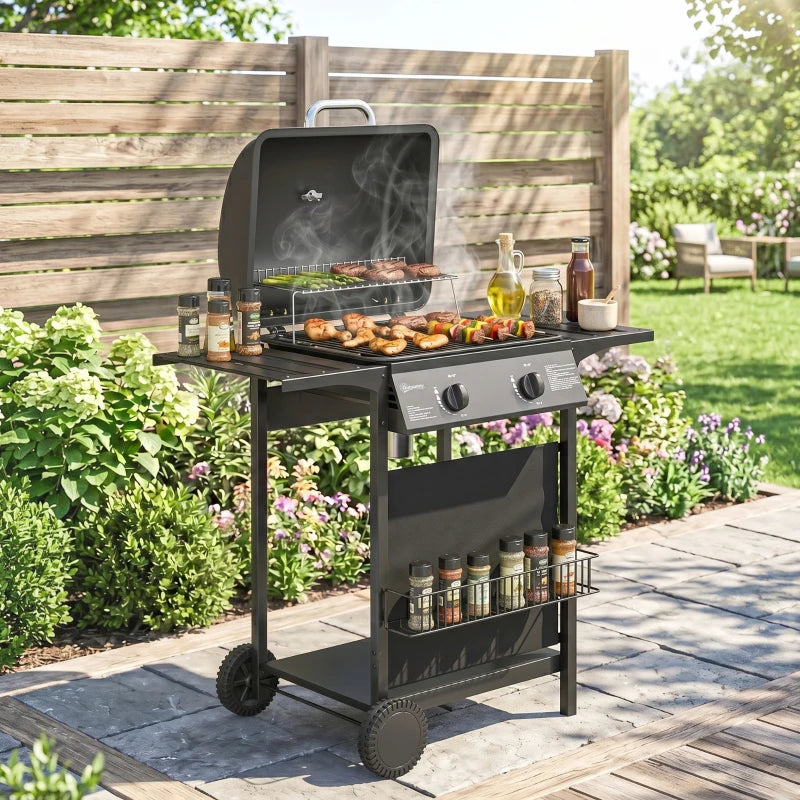 Outdoor black 2-burner gas barbecue grill with lid open, food on grates, side rack