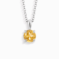 Sterling silver solitaire pendant necklace with round yellow citrine gemstone centerpiece