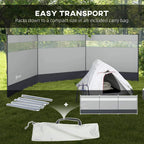 Grey windbreak screen with clear windows, plus folded poles and carry bag included