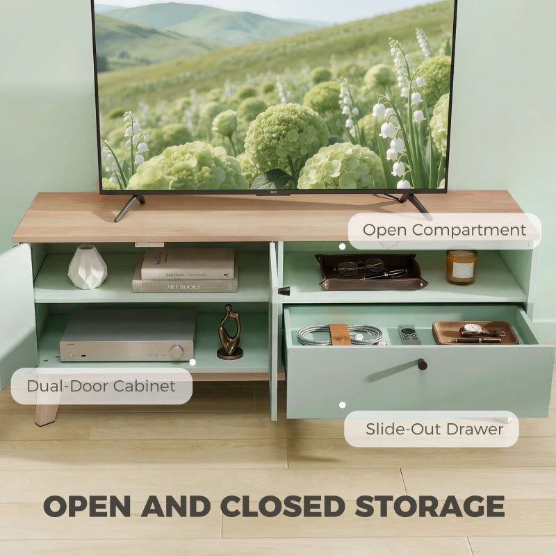 Light green TV console with open storage, two-door cabinet, and slide-out drawer